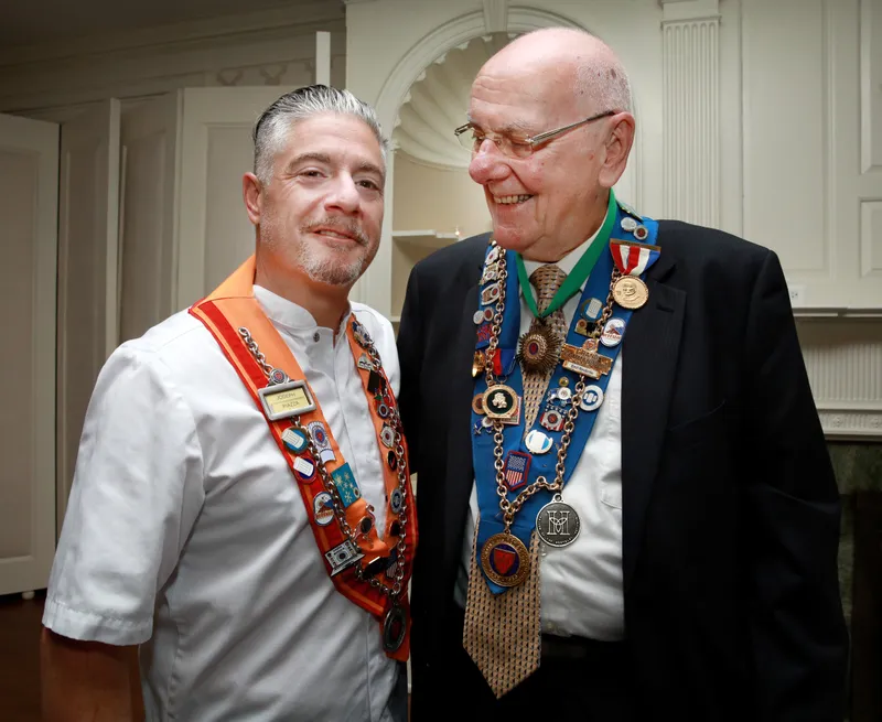 Maître Rôtisseur and longtime officer share a portrait