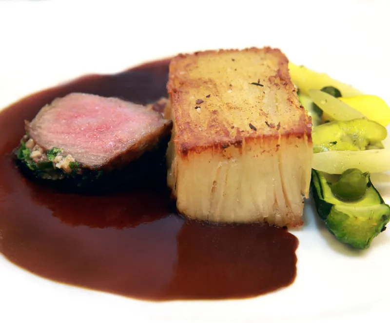 Roasted duck breast with golden potato pavé and spring squash