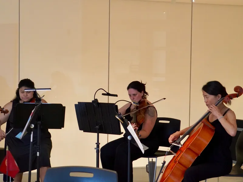 A live string quartet performing during the cocktail hour