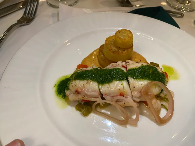 Sea bream with chorizo-braised white beans and mojo verde