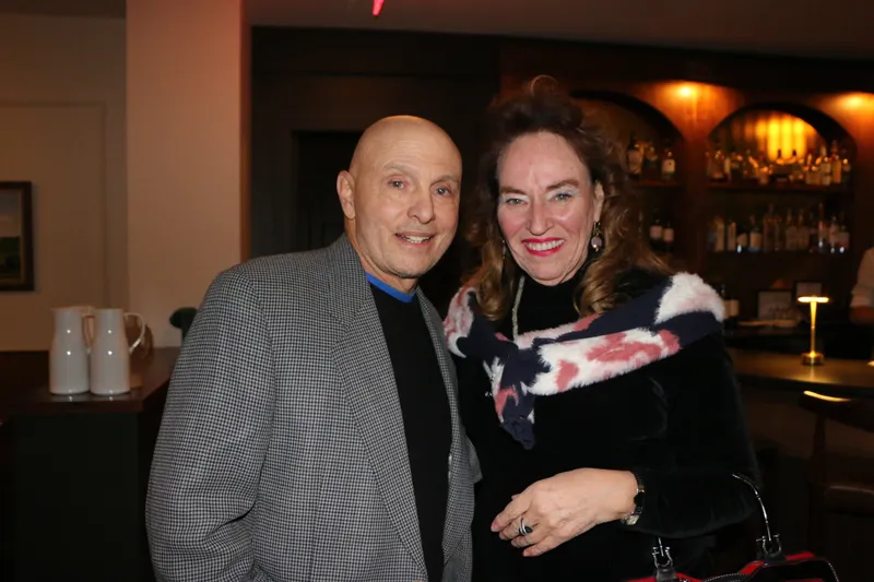 Guests posing at the Fairbanks bar