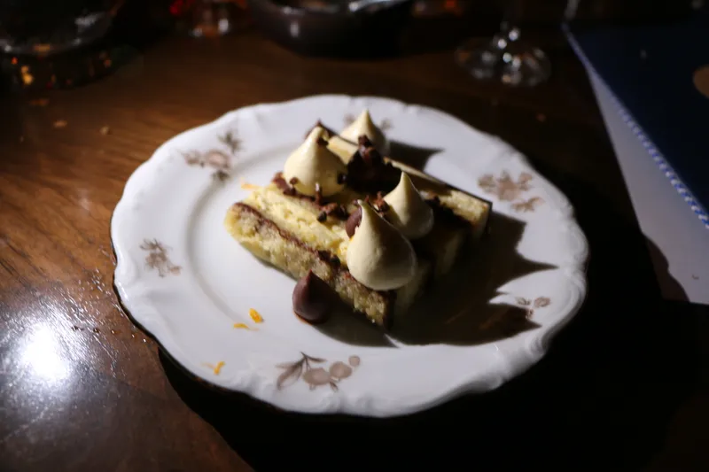 Opera cake with date and maple on vintage china