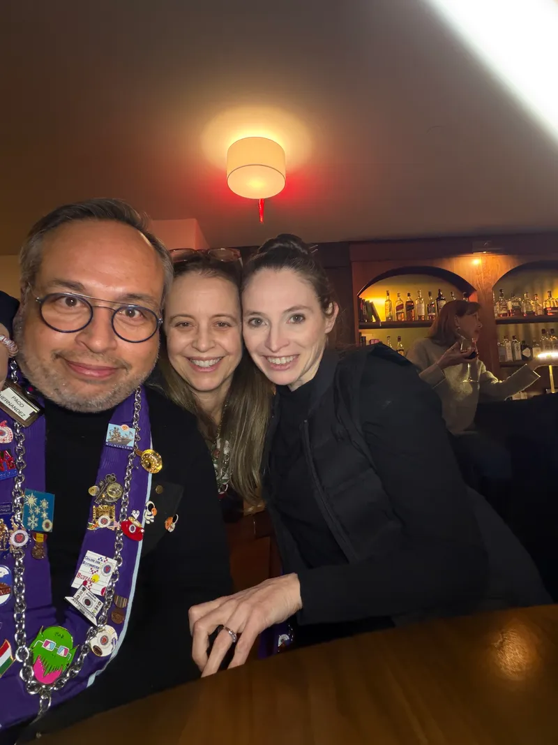 Three guests at the bar